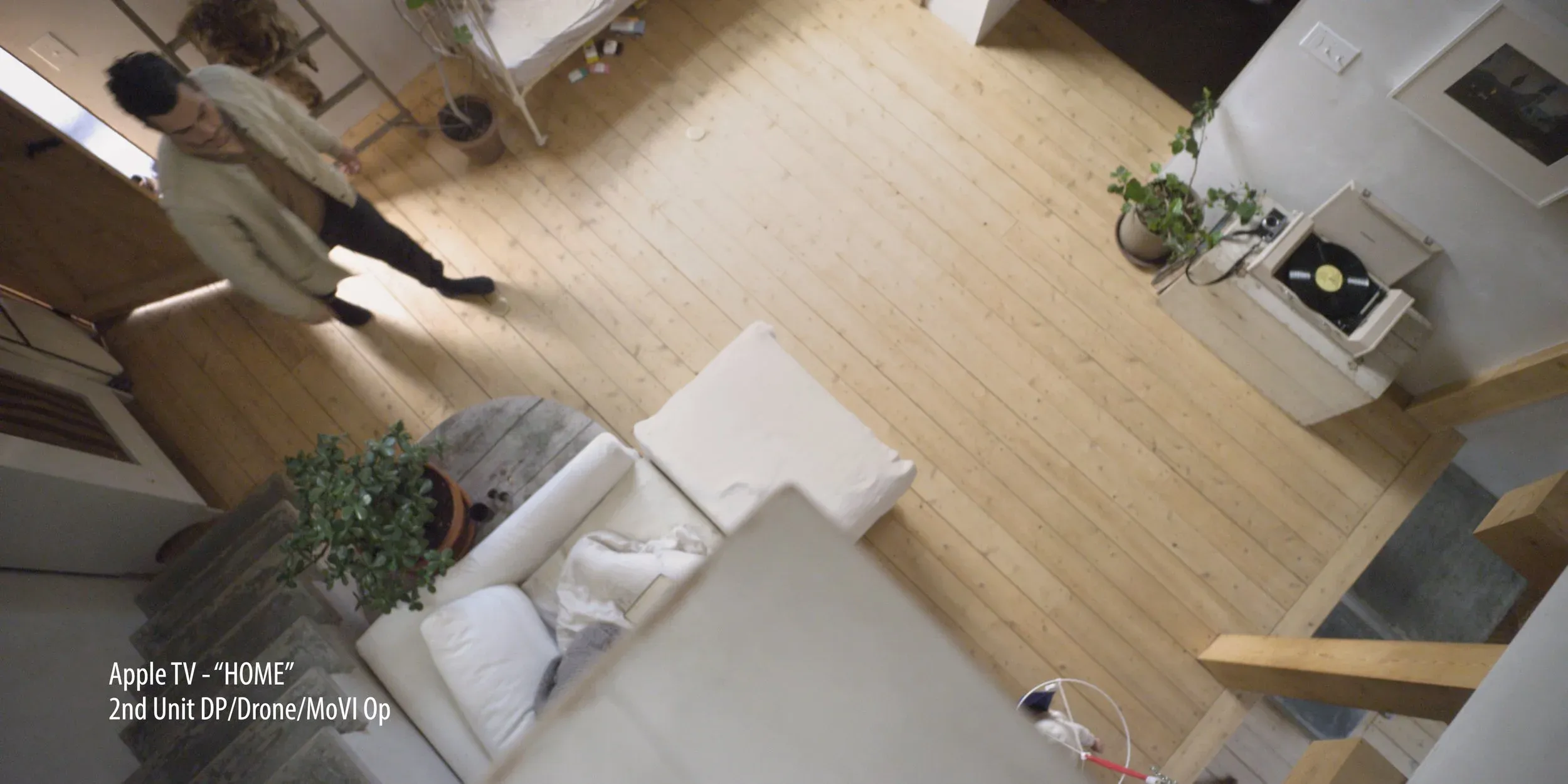 Overhead interior frame from Apple TV’s “HOME”, shot as second-unit drone and MoVI operator